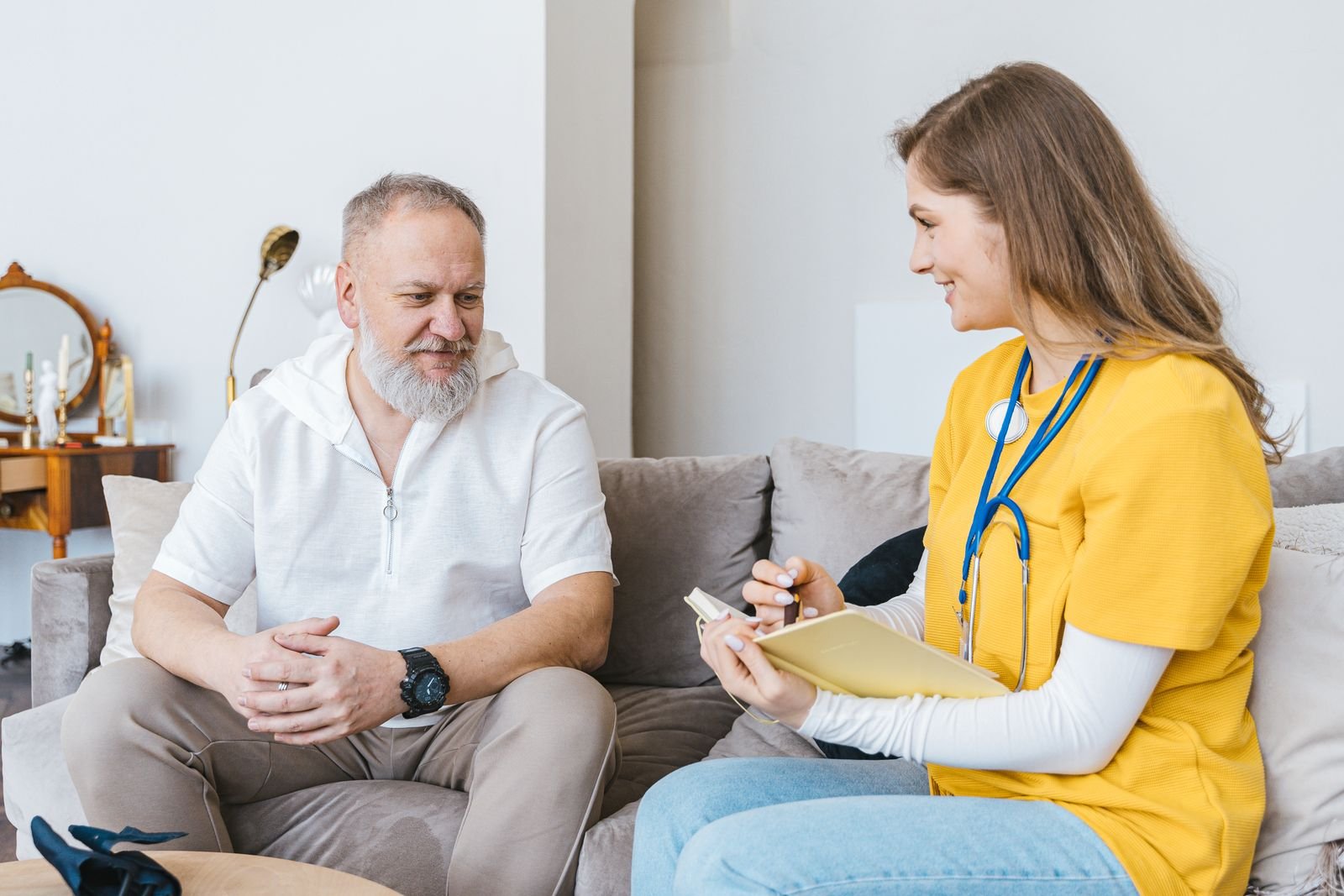 A registered nurse discussing a personalized care plan with a patient